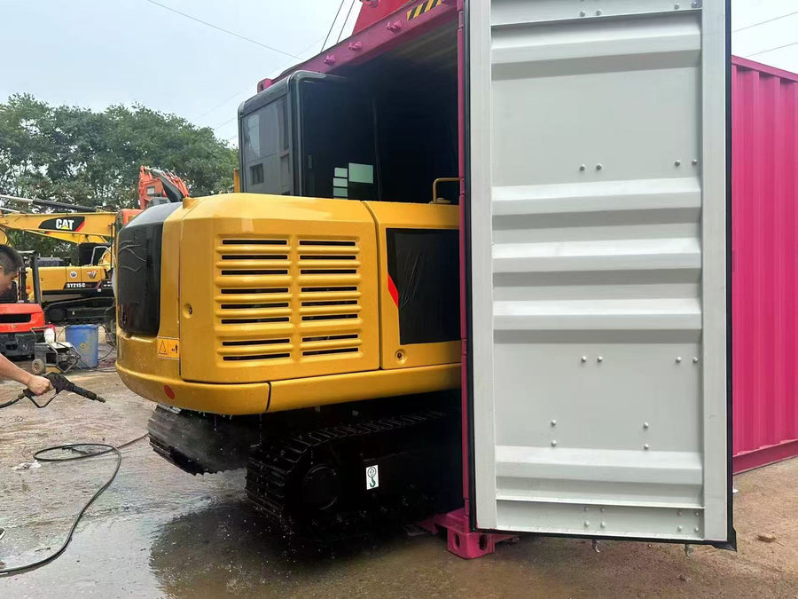 Real used CAT 306E2 undergoing workshop cleaning and preparation before export