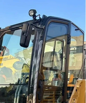 Close-up view of fully detailed cleaned cabin glass on refurbished CAT 306 mini excavator, pre-owned Caterpillar digger renovation service