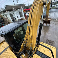 Caterpillar 320 GC Excavator Side View